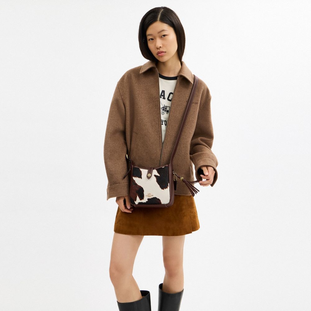 Hadley Mini Crossbody Bag With Cow Print And Tassel