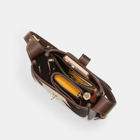 Hadley Mini Crossbody Bag With Cow Print And Tassel