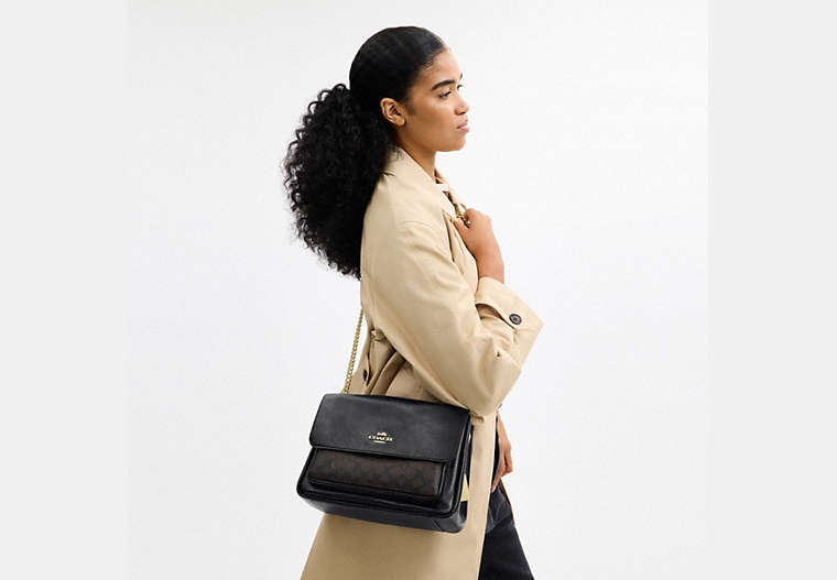 Elodie Crossbody Bag In Signature Canvas