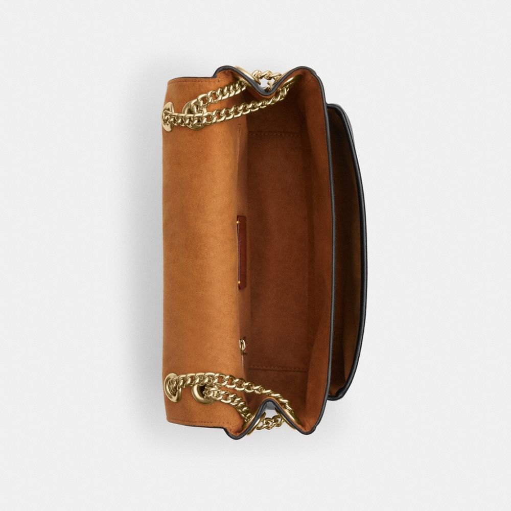 Elodie Crossbody Bag In Signature Canvas