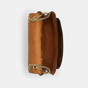 Elodie Crossbody Bag In Signature Canvas