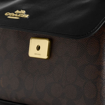 Elodie Crossbody Bag In Signature Canvas
