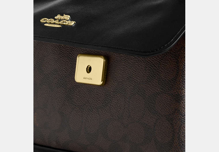 Elodie Crossbody Bag In Signature Canvas