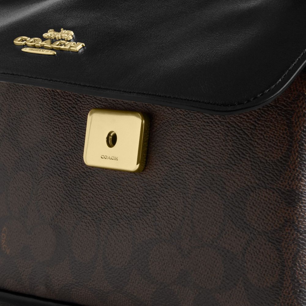 Elodie Crossbody Bag In Signature Canvas
