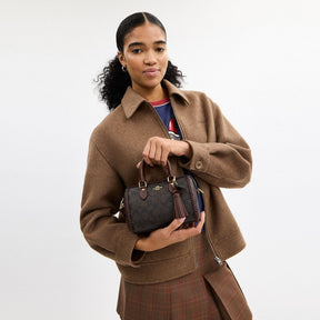 Mini Rowan Crossbody Bag In Signature Canvas With Fringe
