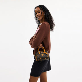 Mini Rowan Crossbody Bag In Signature Canvas With Floral Print