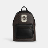 West Backpack In Signature Canvas With Varsity Graphic