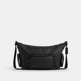 Finn Crossbody Bag With Pockets In Signature Canvas