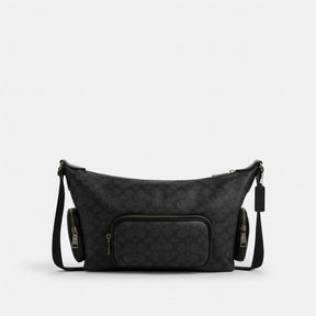 Finn Crossbody Bag With Pockets In Signature Canvas
