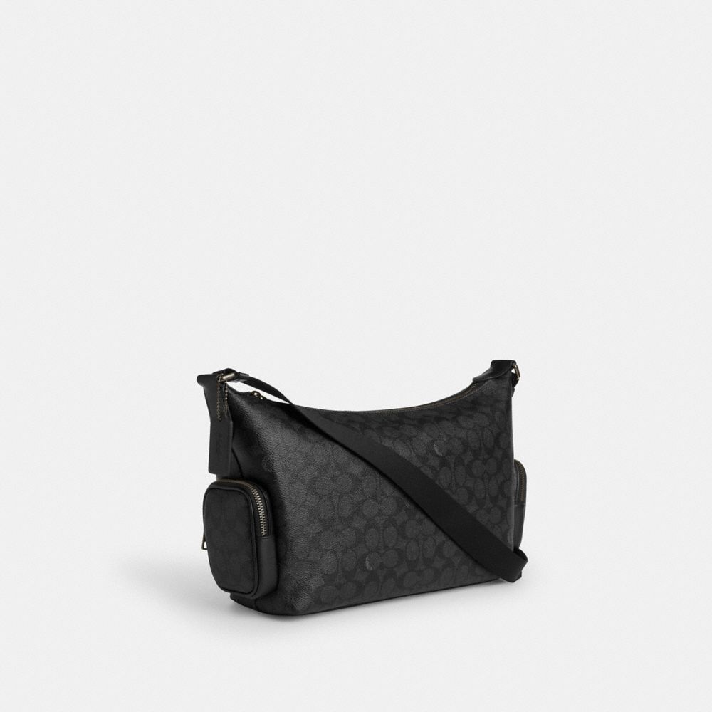 Finn Crossbody Bag With Pockets In Signature Canvas