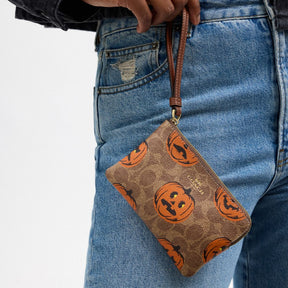 Corner Zip Wristlet In Signature Canvas With Halloween Print