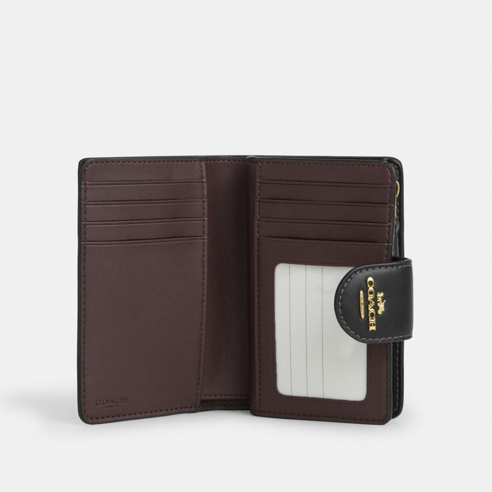 Medium Corner Zip Wallet In Signature Canvas With Floral Print