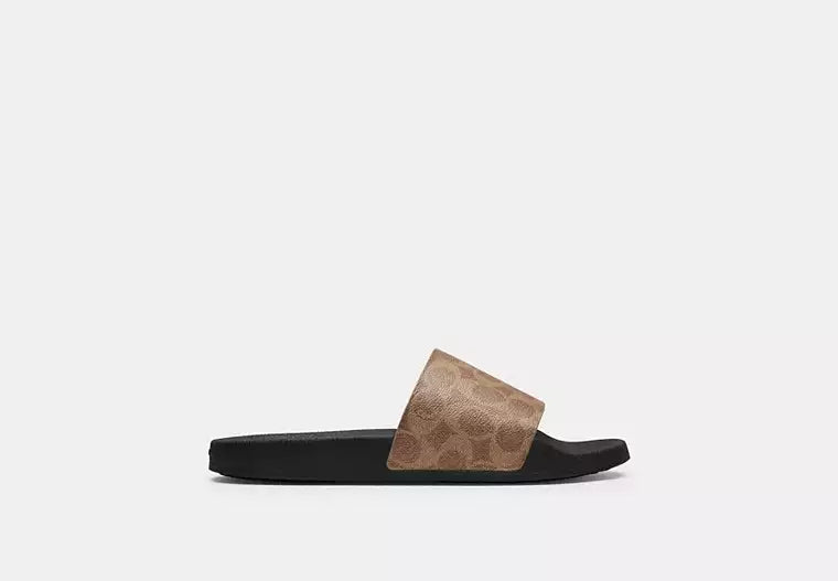 Udele Sport Slide In Signature Canvas slide sandal featuring classic C pattern, cushioned footbed, and durable rubber sole.
