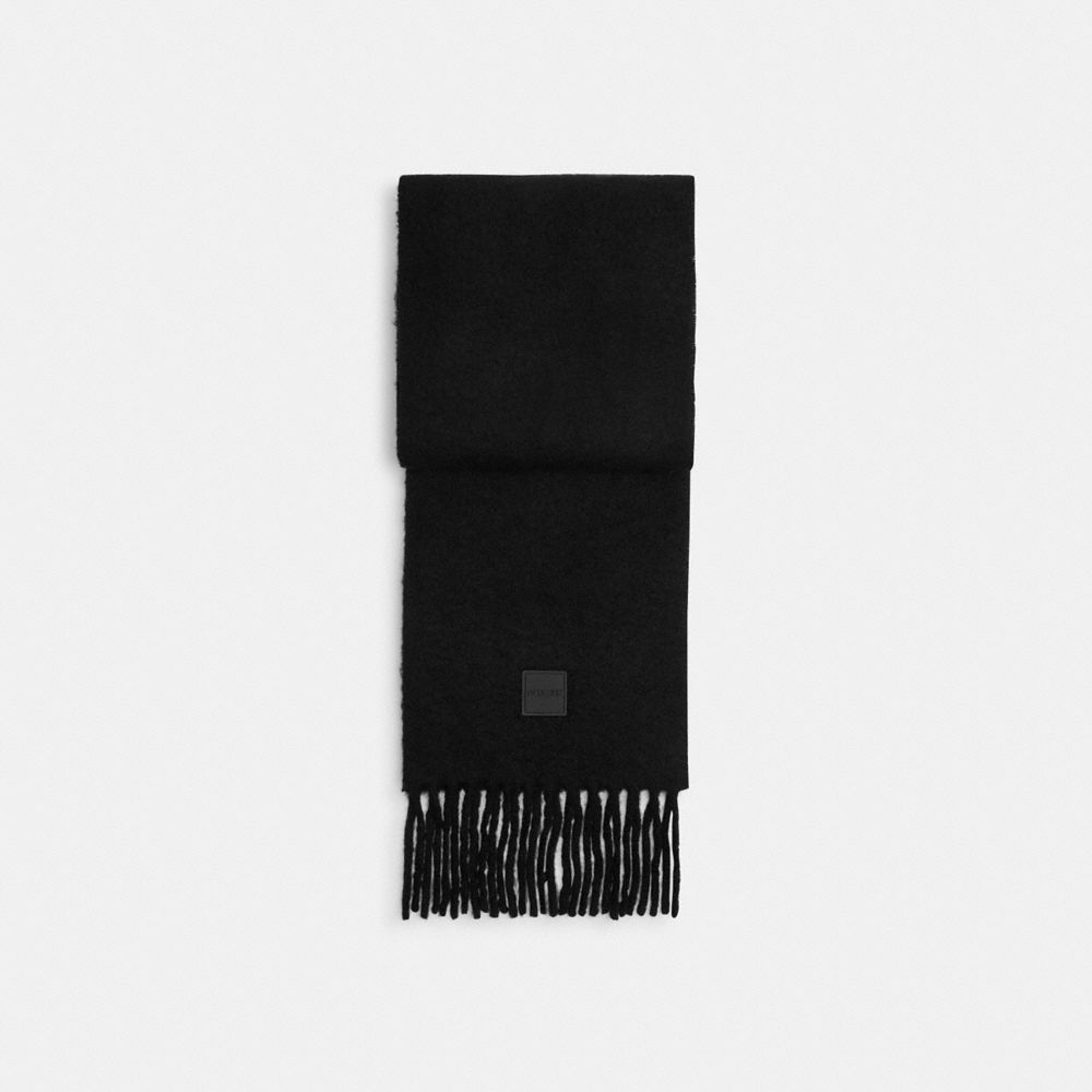 Muffler With Rubber Patch
