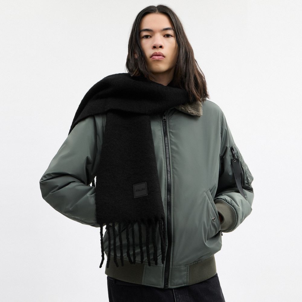 Muffler With Rubber Patch