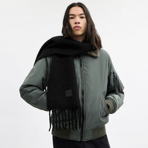 Muffler With Rubber Patch