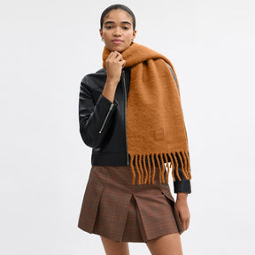 Muffler With Rubber Patch