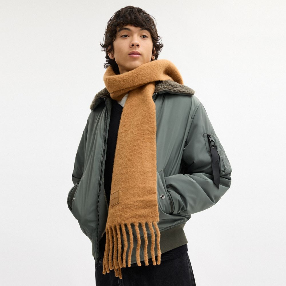 Muffler With Rubber Patch