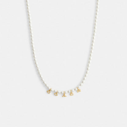 Coach Charms Pearl Necklace
