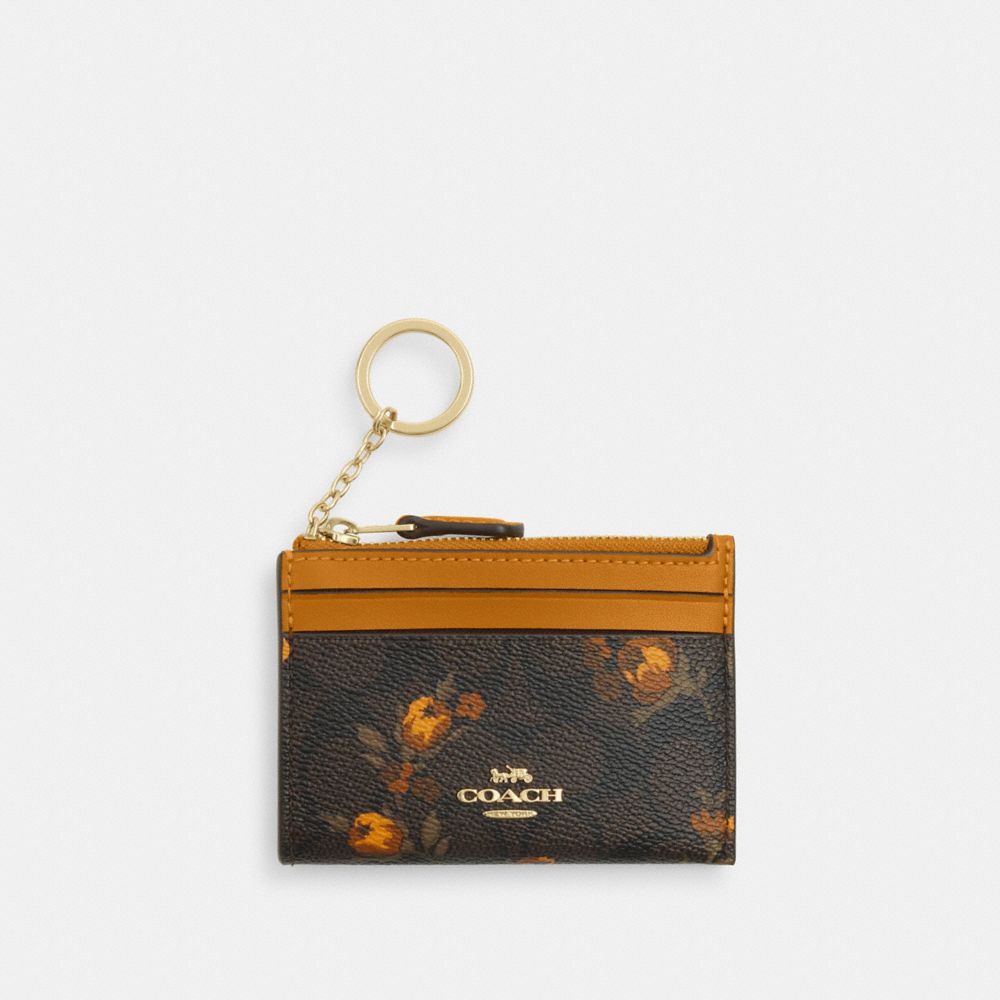 Mini Skinny Id Case In Signature Canvas With Floral Print
