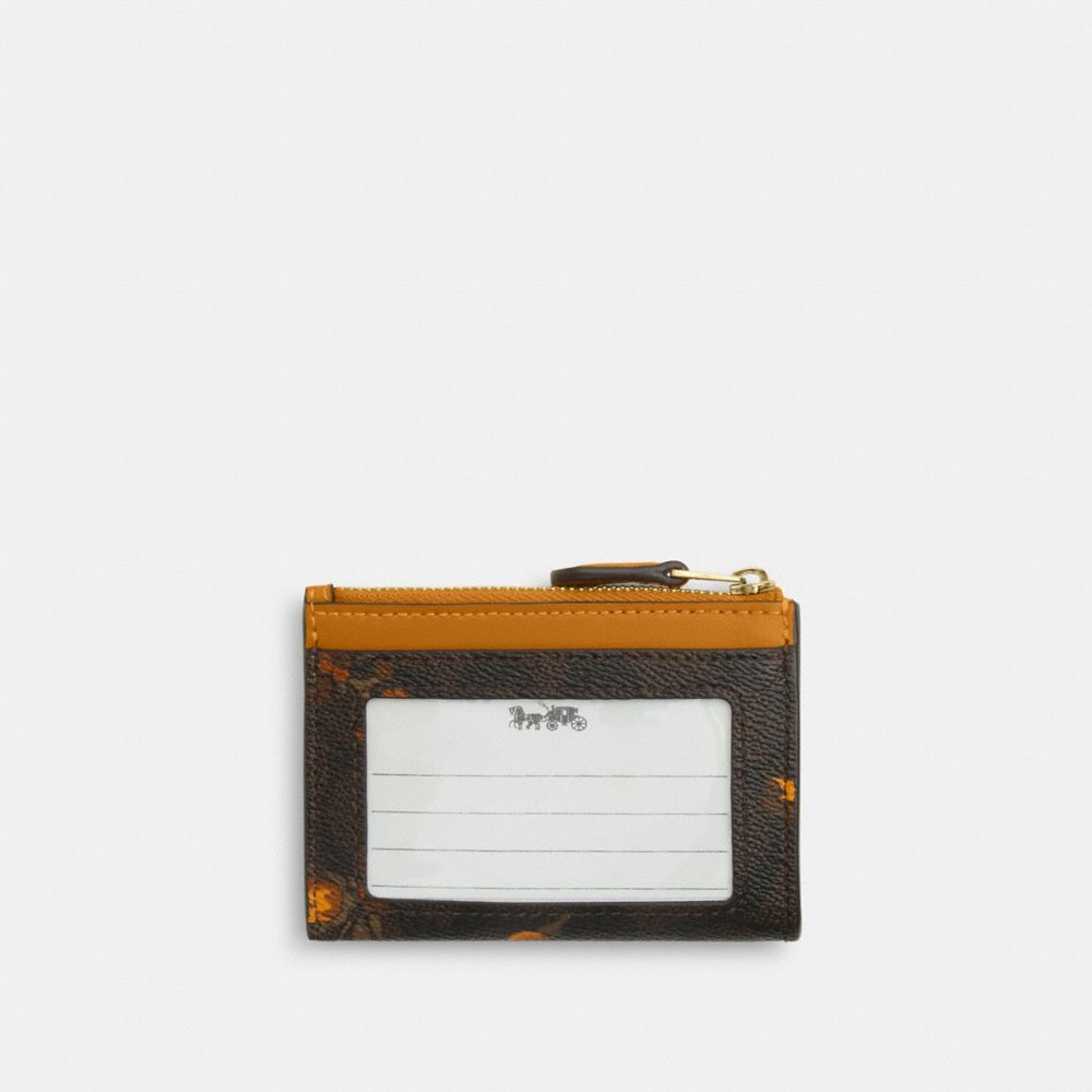 Mini Skinny Id Case In Signature Canvas With Floral Print