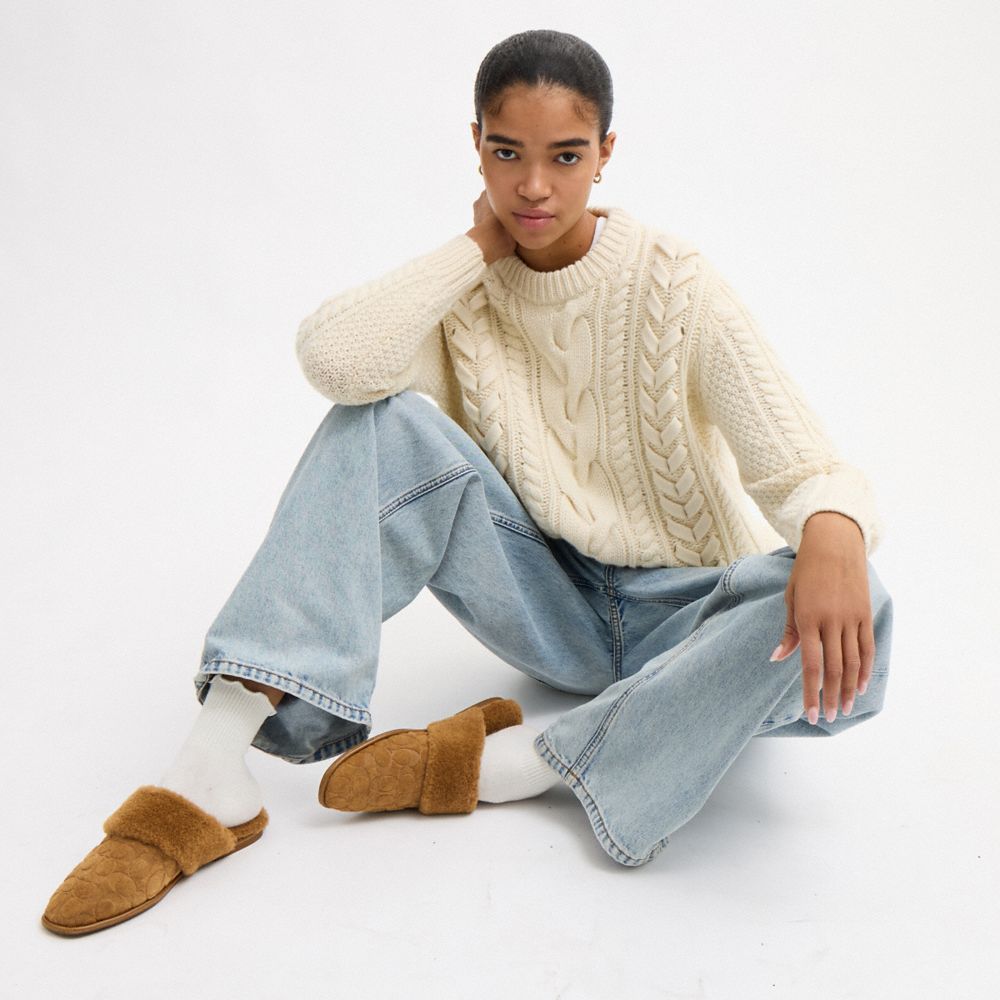 Sherpa Flat Mule In Signature Suede