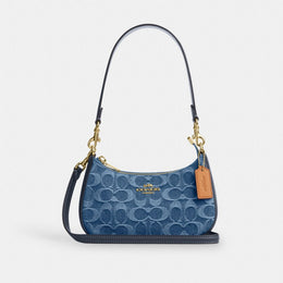 Teri Mini Crossbody Bag In Signature Denim
