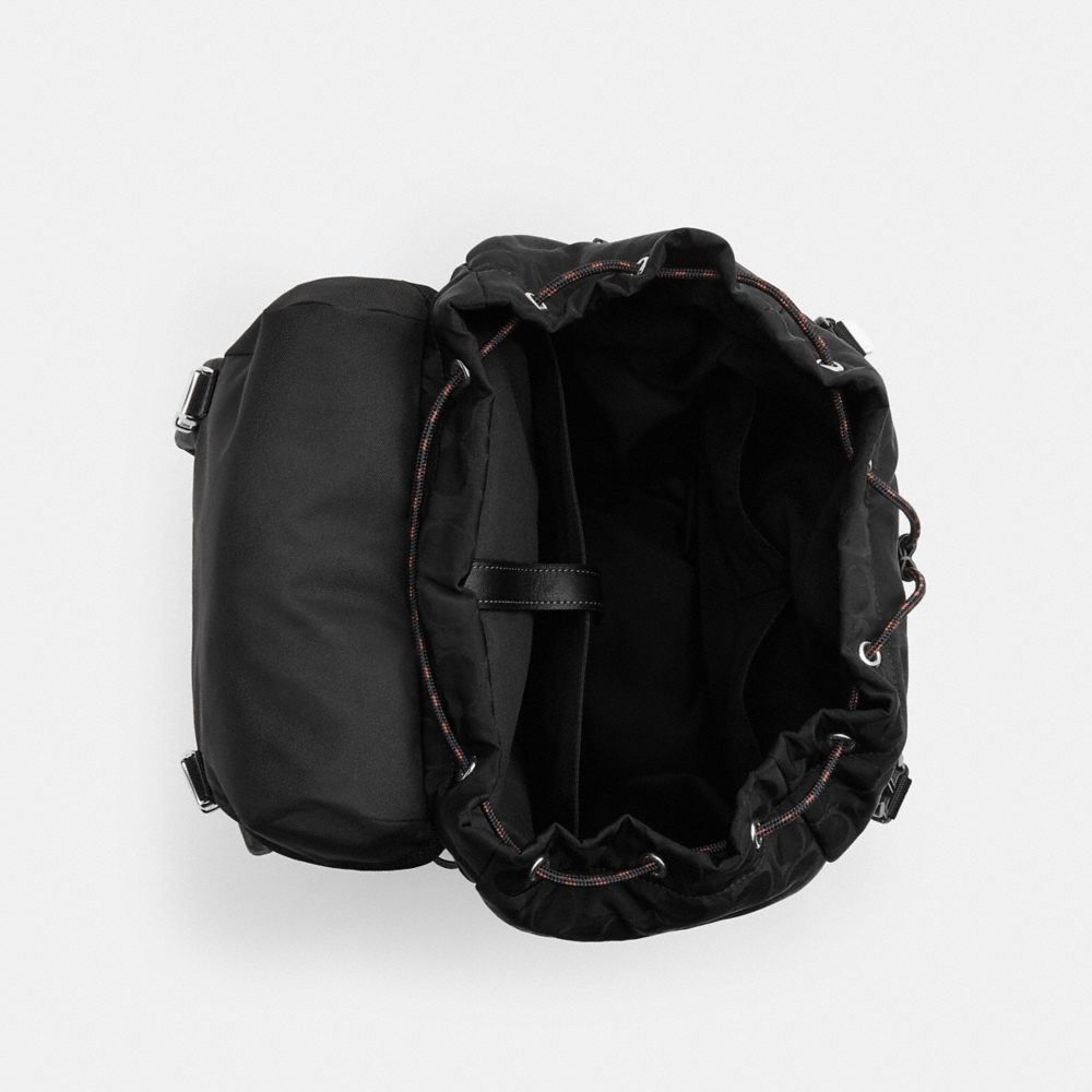 Logan Backpack In Signature Nylon With Charms