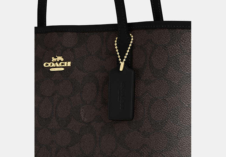 Medium City Tote Bag In Signature Canvas