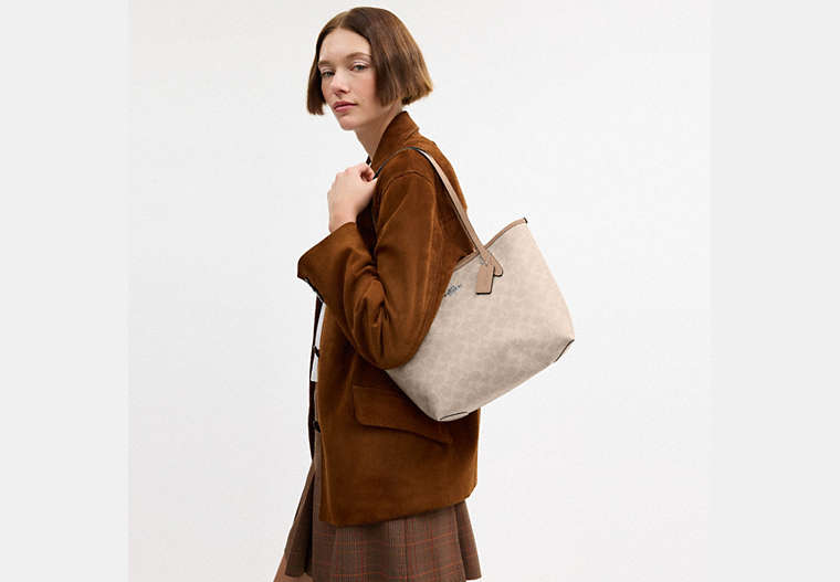 Medium City Tote Bag In Signature Canvas