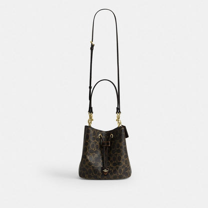 Rowan Bucket Bag In Loved Signature Canvas With Charms