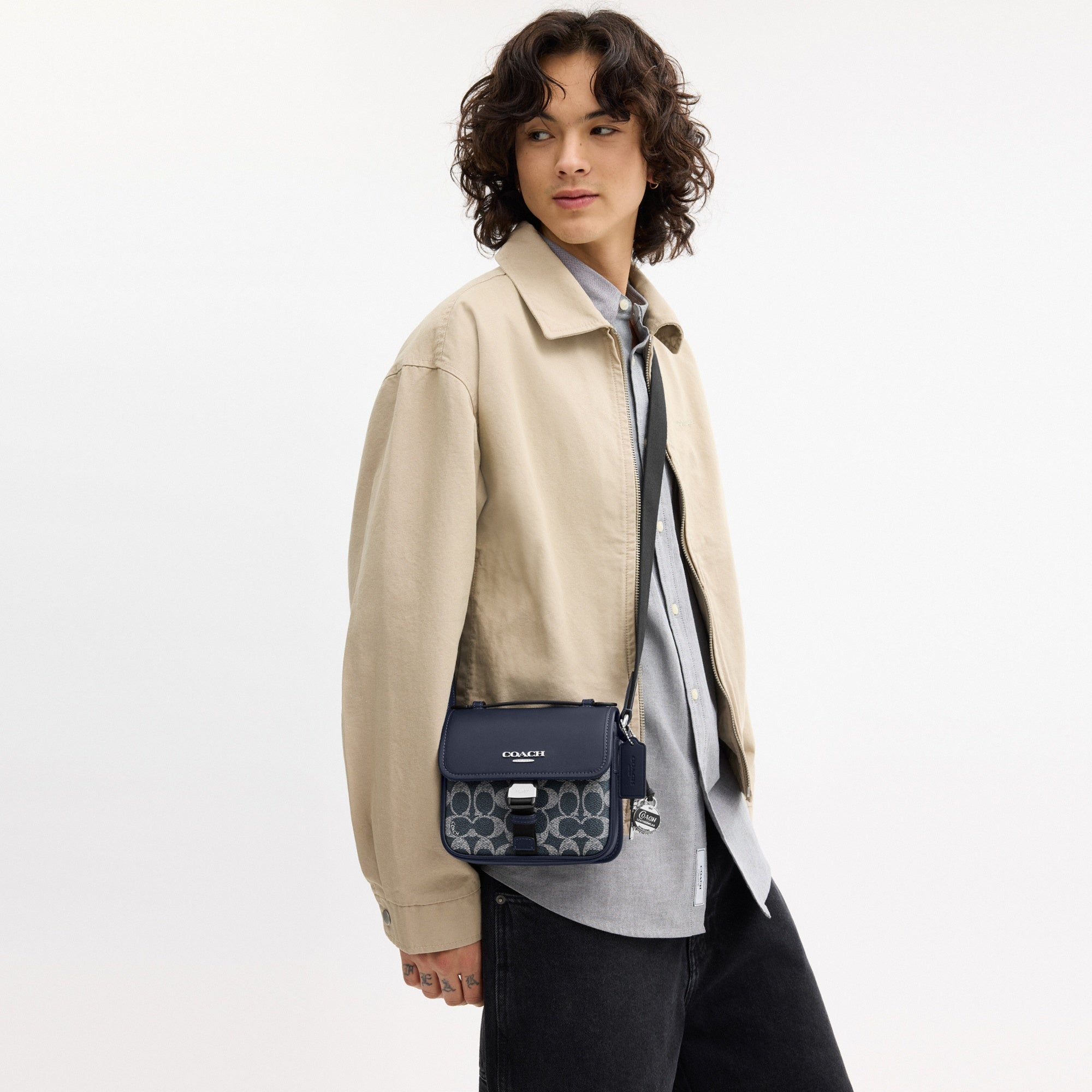 Racer Crossbody Bag In Signature Canvas With Charms