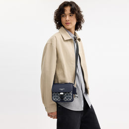 Racer Crossbody Bag In Signature Canvas With Charms