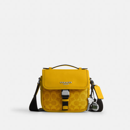 Racer Crossbody Bag In Signature Canvas With Charms