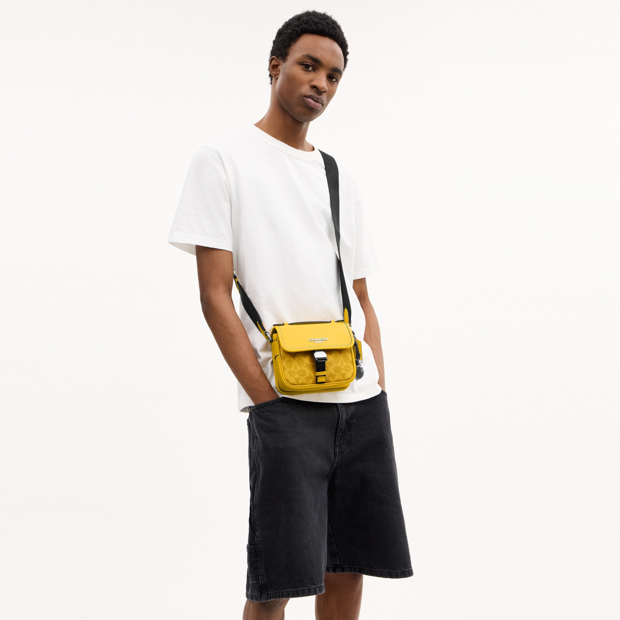 Racer Crossbody Bag In Signature Canvas With Charms