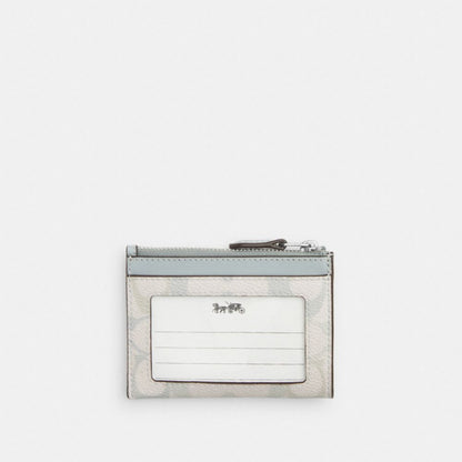 Mini Skinny Id Case In Signature Canvas