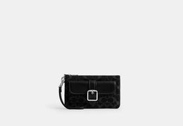 Ashton Wristlet In Signature Denim
