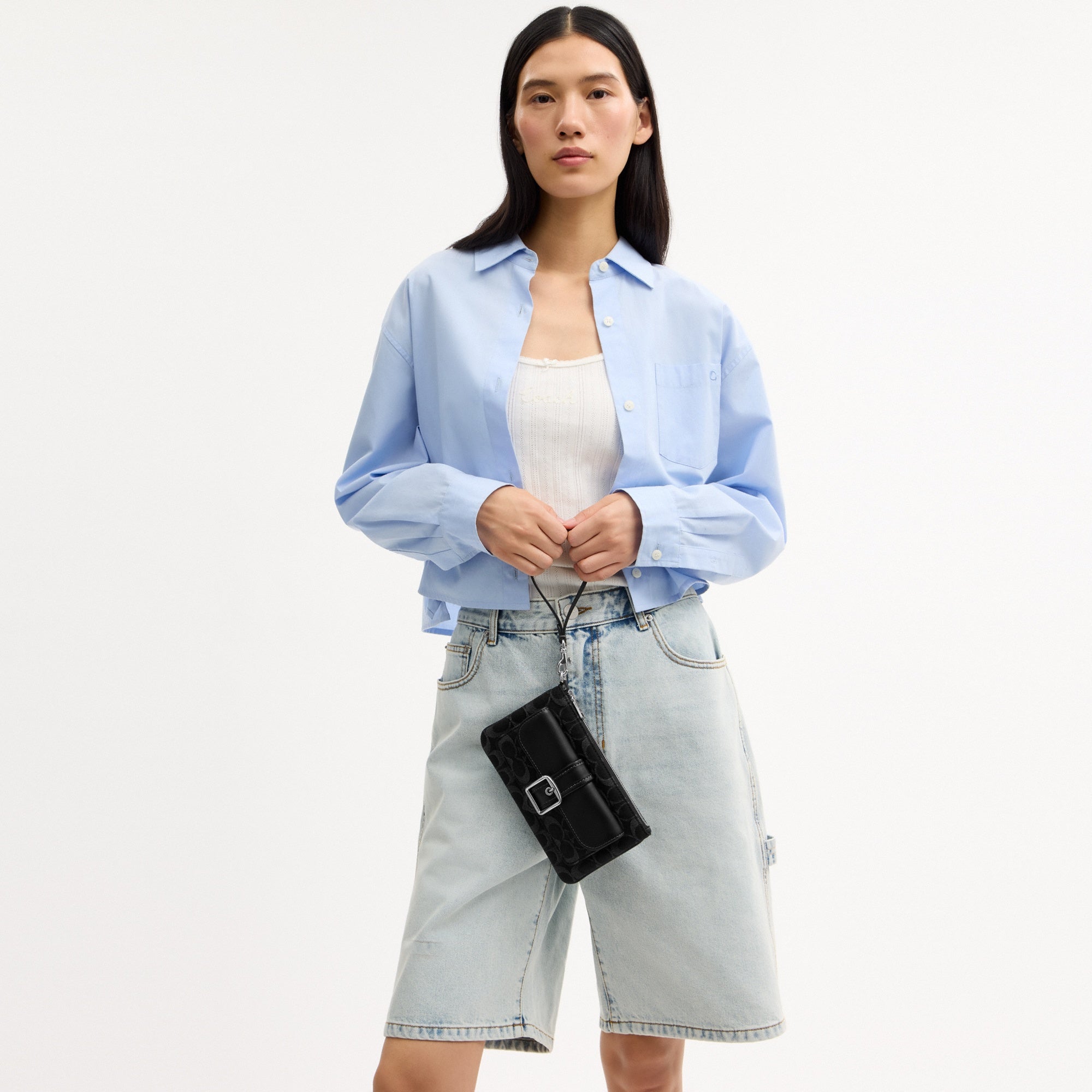 Ashton Wristlet In Signature Denim