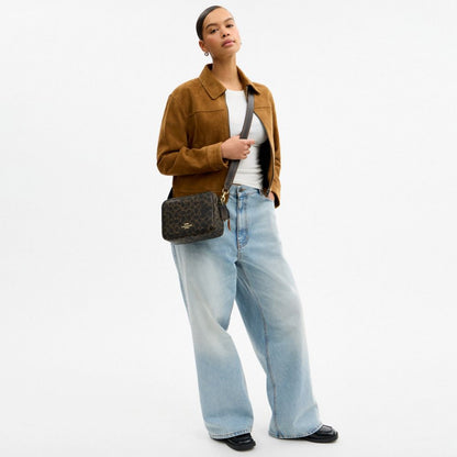 Carey Crossbody Bag In Loved Signature Canvas With Charms