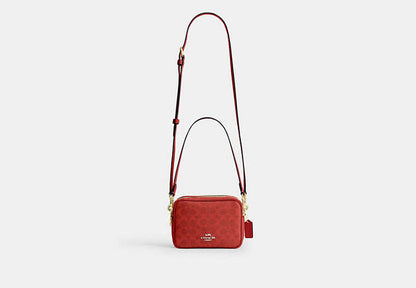 Mini Carey Crossbody Bag In Signature Canvas