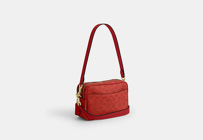 Mini Carey Crossbody Bag In Signature Canvas