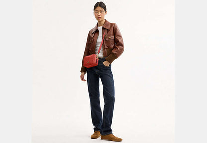 Mini Carey Crossbody Bag In Signature Canvas
