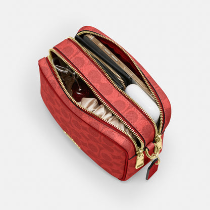 Mini Carey Crossbody Bag In Signature Canvas