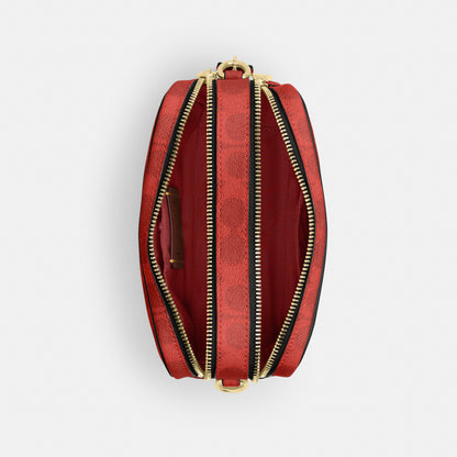 Mini Carey Crossbody Bag In Signature Canvas