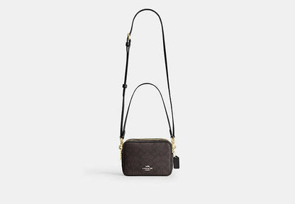 Mini Carey Crossbody Bag In Signature Canvas