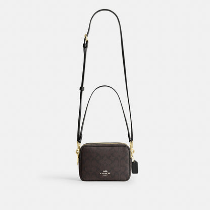 Mini Carey Crossbody Bag In Signature Canvas