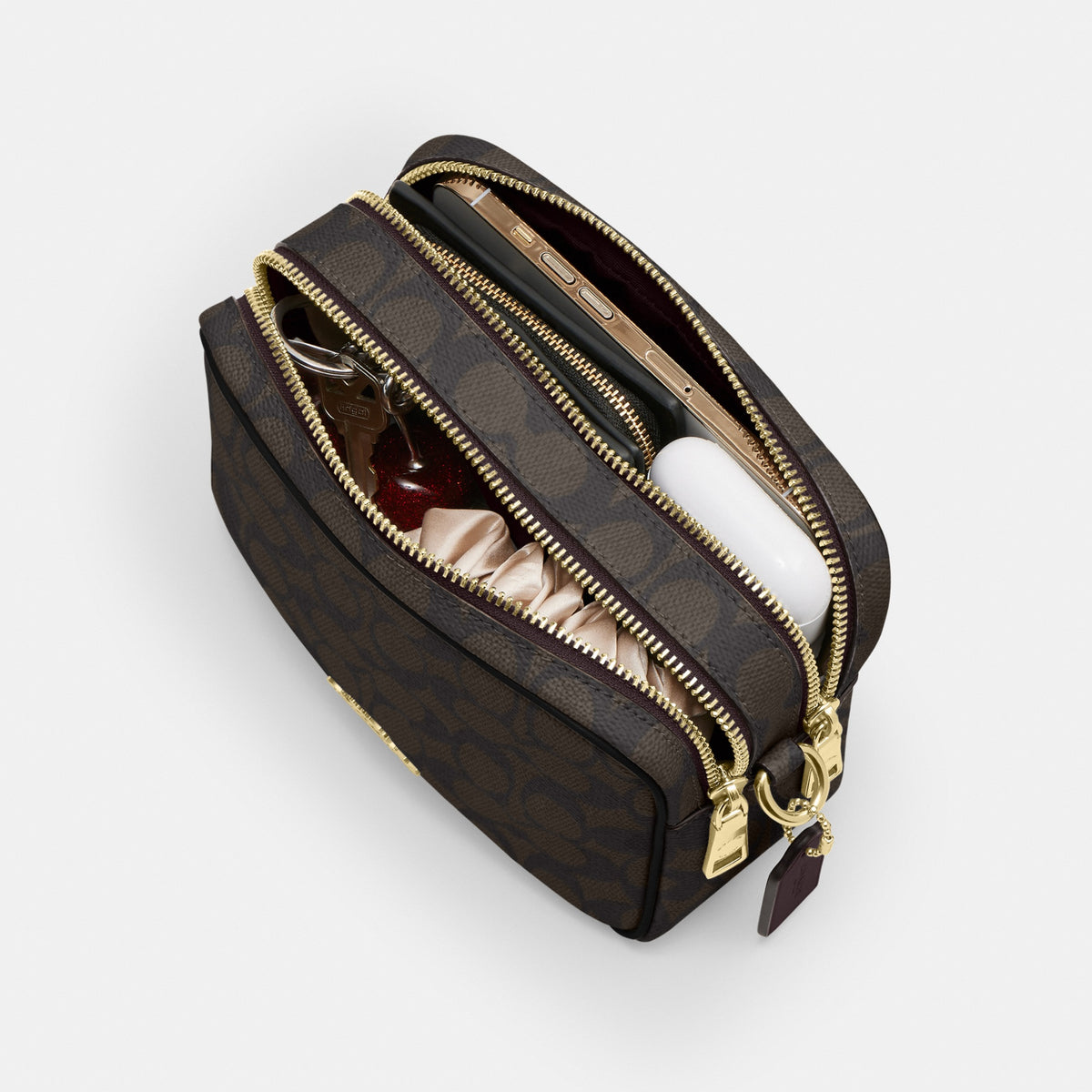 Mini Carey Crossbody Bag In Signature Canvas