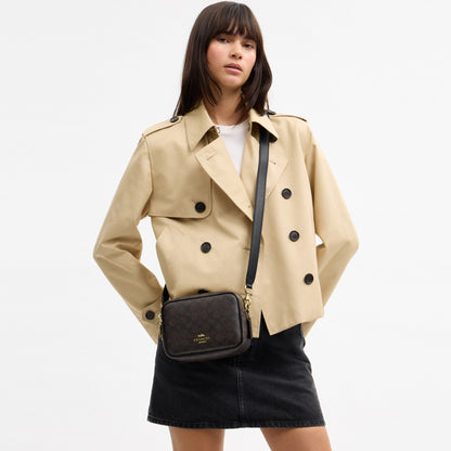 Mini Carey Crossbody Bag In Signature Canvas