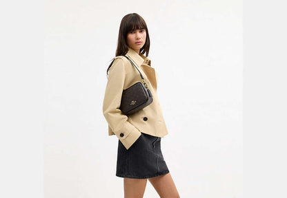 Mini Carey Crossbody Bag In Signature Canvas