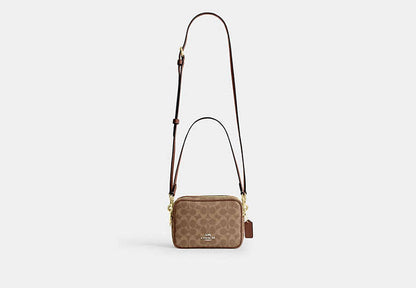 Mini Carey Crossbody Bag In Signature Canvas
